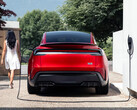Um Model Y Performance carregando em um carregador doméstico Tesla Wall Connector. (Fonte da imagem: Tesla)