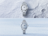 O Grand Seiko SBGX359 (em cima) e o SBGX361 (em baixo), retratados contra fundos estilizados de neve e céu.