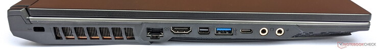 Lado esquerdo: Kensington lock, Gigabit LAN, HDMI, Mini DisplayPort 1.2, 1x USB 3.1 Gen 1 Type-A, 1x USB 3.1 Gen 1 Type-C, 1x fone de ouvido, 1x microfone