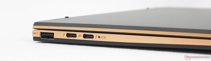 Esquerda: USB-A 3.2 Gen. 1, 2x USB-C Thunderbolt 4 com DisplayPort + Power Delivery