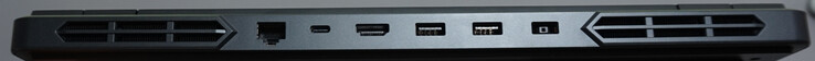 Portas na parte traseira: Porta LAN (1 Gbit/s, USB-C (10 Gbit/s, DP, carregamento de 140W), HDMI 2.1, 2x USB-A (5 Gbit/s), porta de alimentação