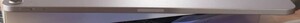 Parte superior: controle de volume, dock magnético do Apple Pencil