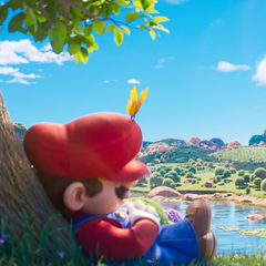 Em um momento de tranquilidade antes da aventura cósmica, Mario tira um cochilo embaixo de uma árvore colorida - provocando a calma antes da tempestade interestelar em The Super Mario Galaxy Movie.