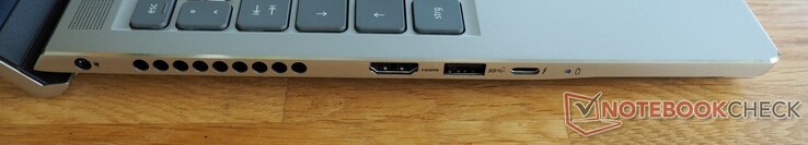 Lado esquerdo: Fonte de alimentação, HDMI 2.0, USB-A 3.2 Gen 1, Thunderbolt 4 (incl. DisplayPort)