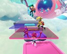Captura de tela do Popucom com personagens em plataformas nas nuvens resolvendo quebra-cabeças