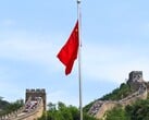 A bandeira chinesa com a Grande Muralha da China ao fundo