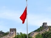A bandeira chinesa com a Grande Muralha da China ao fundo