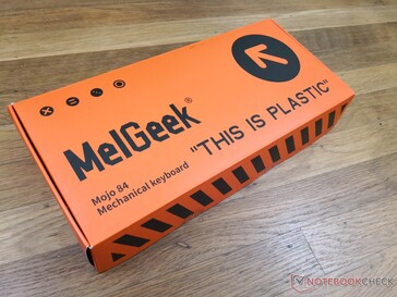Design de embalagem industrial laranja para combinar com o teclado
