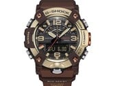 Close-up do G-Shock Mudmaster GG-B100XMH-5A, destacando sua caixa e luneta nas cores amarelo-ouro claro e marrom.