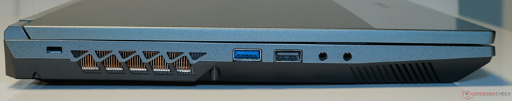 Esquerda: slot de trava Kensington, USB 3.2 Gen1 Tipo A, USB 2.0 Tipo A, entrada de linha, conector de áudio combinado CTIA de 3,5 mm