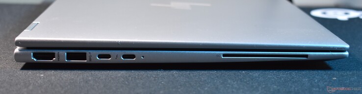 esquerda: HDMI, USB A 3.2 Gen 1, 2x Thunderbolt 4, leitor de cartão inteligente