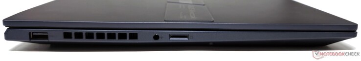 Esquerda: USB 3.2 Gen1 Tipo A, conector de áudio combinado de 3,5 mm, slot para cartão microSD