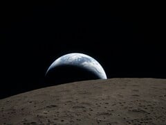 Uma imagem mostrando a Lua e a Terra.