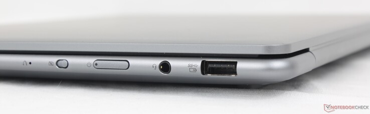 À direita: Botão de reinicialização da Lenovo, botão de desligar a câmera, botão liga/desliga, fone de ouvido de 3,5 mm, USB-A (5 Gbps)