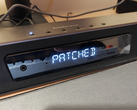 Uma imagem do Creative Katana V2X com o texto "Patched" visível.