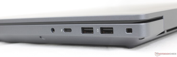 Direita: Fone de ouvido de 3,5 mm, USB-C Thunderbolt 4 (40 Gbps) com DisplayPort 2.1 + Power Delivery, USB-A 3.2 Gen. 1, slot de trava