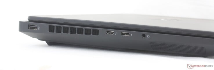 Esquerda: USB-A (10 Gbps), 2x USB-C Thunderbolt 4 com DisplayPort 2.1 + Power Delivery 3.1 (40 Gbps), conector de 3.5 mm para headset
