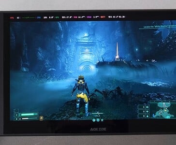 Returnal em execução no computador de mão AMD Ryzen AI 9 HX 370, mostrando na tela o benchmark de desempenho no jogo. (Fonte da imagem: The Phawx)