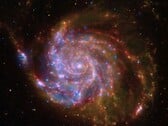 Uma imagem mostrando uma galáxia espiral.
