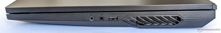 Lado direito: 1x microfone, 1x fone de ouvido, 1x USB 2.0