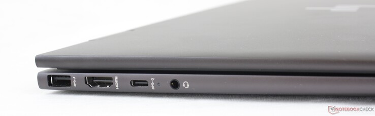 Esquerda: USB-A 10 Gbps, HDMI 2.0b, USB-C c/ DisplayPort 1.4 e Power Delivery, áudio combinado de 3.5 mm
