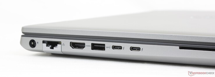 Esquerda: adaptador AC, Gigabit RJ-45, HDMI 2.1, USB-A 3.2, 2x Thunderbolt 4 c/ Entrega de energia + DisplayPort 1.4, leitor de Smart Card