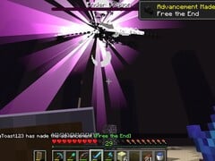Uma captura de tela de um usuário derrotando o Dragão Ender no Minecraft