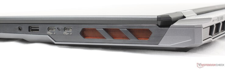 Direita: fone de ouvido de 3,5 mm, USB-A 3.2 Gen 2, 2x USB-C 4.0 Thunderbolt 4 com DisplayPort 2.1 + Power Delivery 3.1