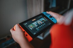 A família Nintendo Switch finalmente suporta áudio Bluetooth. (Fonte da imagem: Álvaro Reyes)