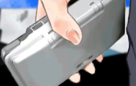 Segurando um Nintendo DS - "DAS". (Fonte da imagem: Cing Wiki)