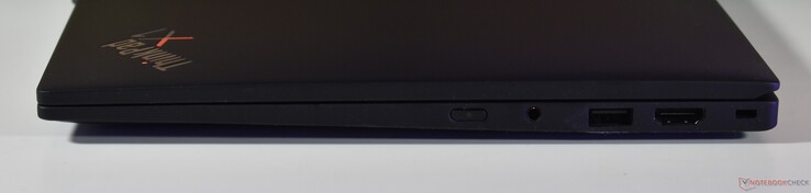 direita: áudio de 3,5 mm, áudio de 3,5 mm, USB-A 3.2 Gen 1, HDMI, trava Kensington