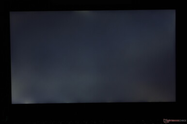 Sangramento moderado e irregular da luz de fundo no canto inferior esquerdo