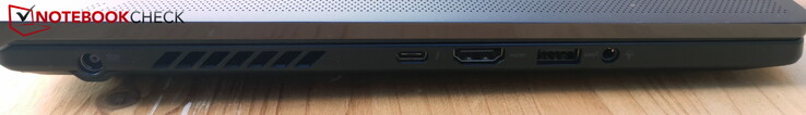 Esquerda: Alimentação, Thunderbolt 4 com DP &amp; PD, HDMI, USB-A 3.2 Gen2, conector de fone de ouvido