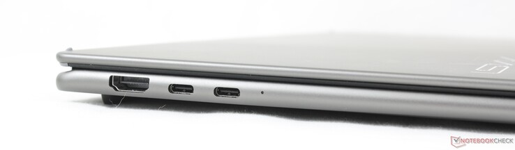 Esquerda: HDMI 2.1, 2x USB-C Thunderbolt 4 com DisplayPort + Power Delivery