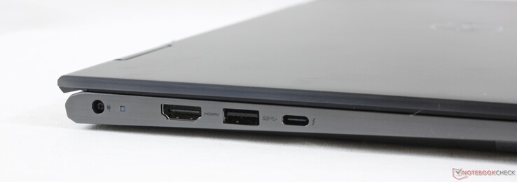 Esquerda: adaptador AC, HDMI 2.0, USB-A 3.2 Gen. 1, Thunderbolt 4 c/ PD e DP