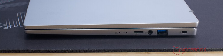 Leitor de cartão de memória (MicroSD), conector de áudio de 3,5 mm, USB 3.2 Gen 1 (USB-A), slot para trava Kensington