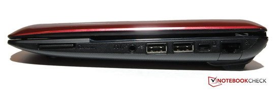 Lado Direito: Leitor de cartões, Áudio, 2x USB 2.0, Kensington, LAN