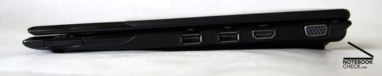 Lado direito: leitor de cartões 7 em 1, 2x USB, HDMI, VGA