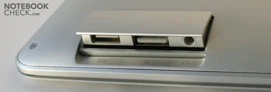 Lado Direito: Mini-DVI, USB, Fones
