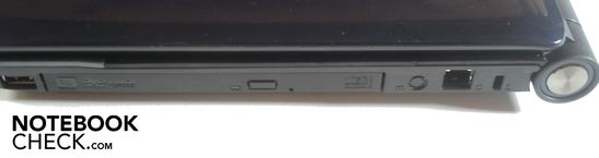Direita: USB 2.0, gravador de DVD, modem RJ-11, Trava Kensington