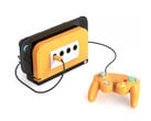 O Retro Fighters BattleDock com uma placa frontal laranja picante. (Fonte da imagem: Retro Fighters/Kickstarter)
