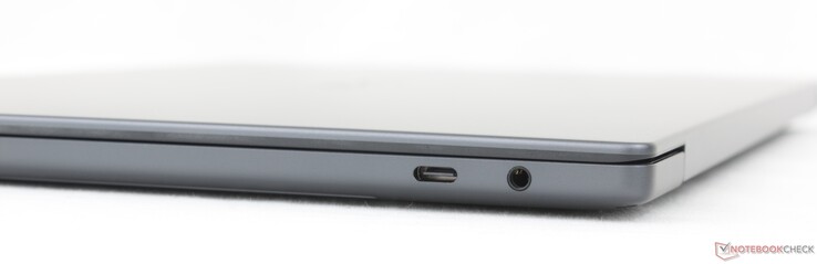 Direito: USB-C Thunderbolt 4 com DisplayPort 2.1 + Power Delivery, áudio combinado de 3,5 mm