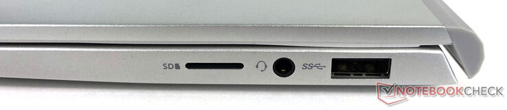 Direita: leitor de cartões microSD, conector de áudio, USB 3.2 Gen 1 Tipo A