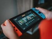 Uma imagem do console Nintendo Switch em uso