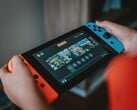 Uma imagem do console Nintendo Switch em uso
