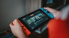 Uma imagem do console Nintendo Switch em uso