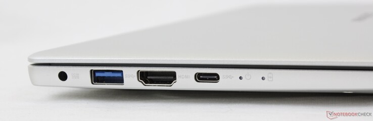 Esquerda: adaptador AC, USB-A 3.0, HDMI, USB-C c/ DisplayPort + Fornecimento de energia