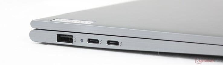 Esquerda: USB-A 3.2 Gen 1 (5 Gbit/s, sempre ligado), 2x USB-C 4.0 com Thunderbolt 4 (40 Gbit/s, DisplayPort 2.1, Power Delivery 3.0)