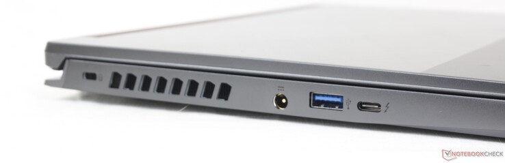Esquerda: Kensington lock, adaptador AC, USB-A 3.2 Gen. 2, USB-C c/ Thunderbolt 4 + DisplayPort 1.4