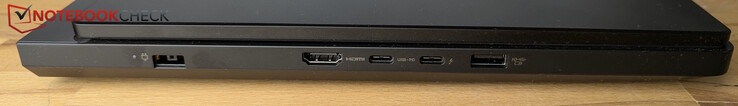 Esquerda: alimentação, HDMI, USB-C com Thunderbolt 4 (DisplayPort), USB-C (10 Gbps, fornecimento de energia 65-100 W, DP), USB-A (10 Gbps, sempre ligado)